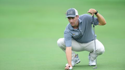 Todd lines up a putt on the tenth green during the first round of the Wyndham Championship.