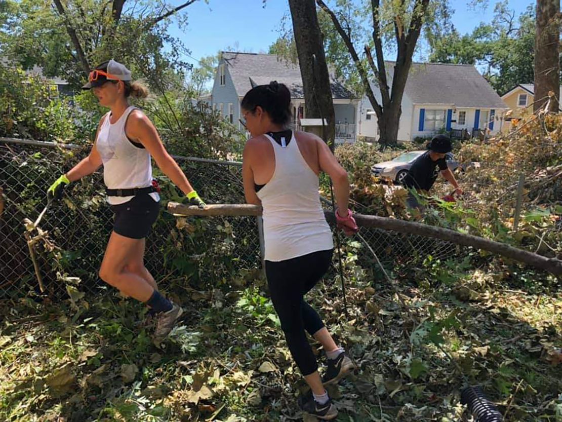 Members of a biking group in Cedar Rapids, Iowa, are now spending their time helping clean up the damage from the massive windstorm that hit the city two weeks ago.