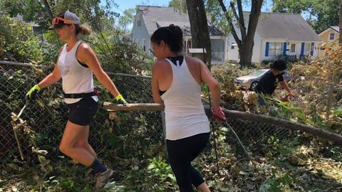 Members of a biking group in Cedar Rapids, Iowa, are now spending their time helping clean up the damage from the massive windstorm that hit the city two weeks ago.