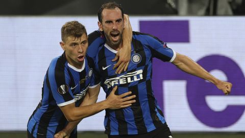 Inter's Diego Godin celebrates his goal that drew the two sides level in the first half.