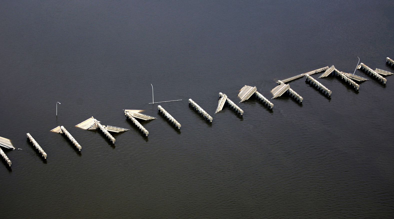 A section of the Mississippi bridge connecting Ocean Springs with Biloxi was wiped out by the storm.