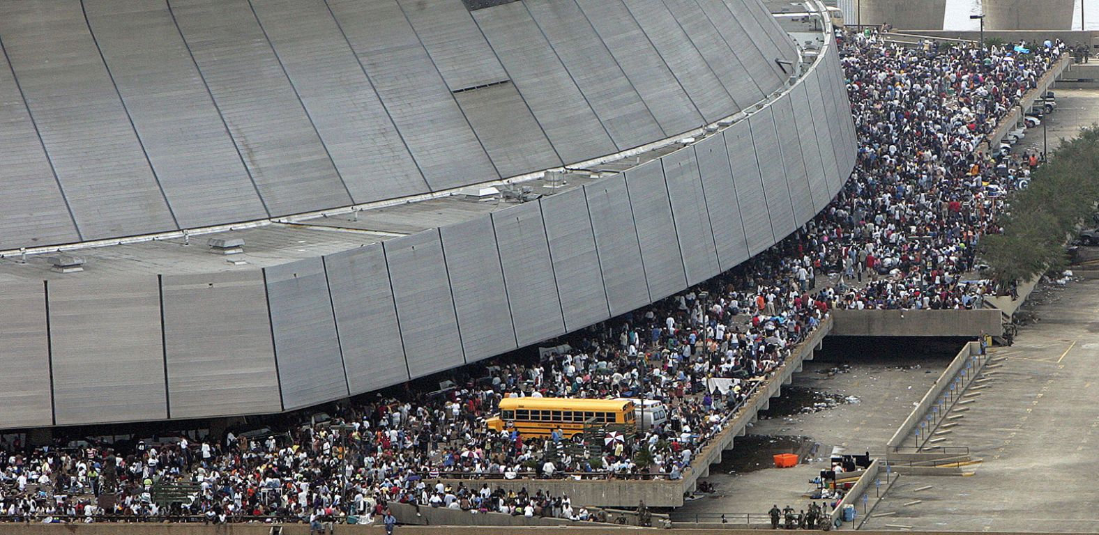 Wind and water damage to the Superdome roof created unsafe conditions, leading authorities to conduct emergency evacuations there.