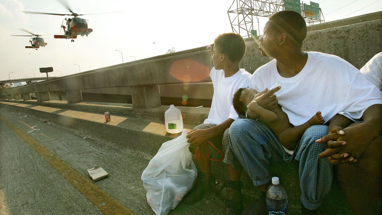People stranded by Hurricane Katrina waiting to be airlifted, September 4, 2005, New Orleans, Louisiana