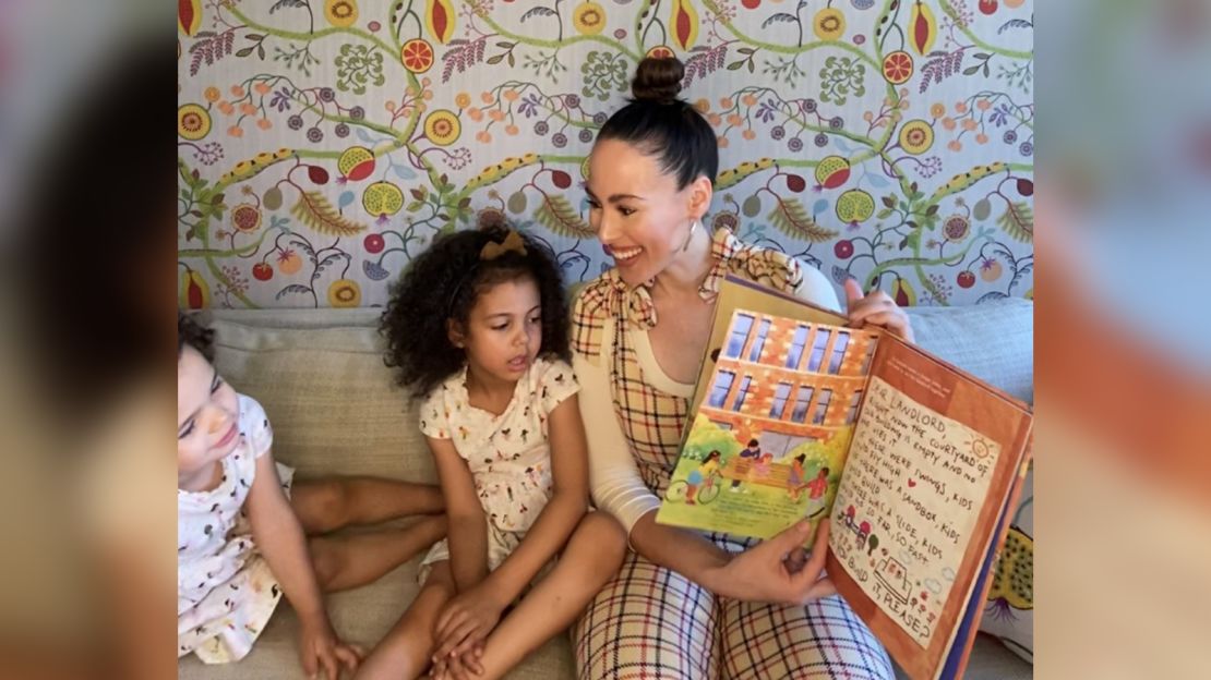 Meena Harris reading "Kamala and Maya's Big Idea" to her daughters.