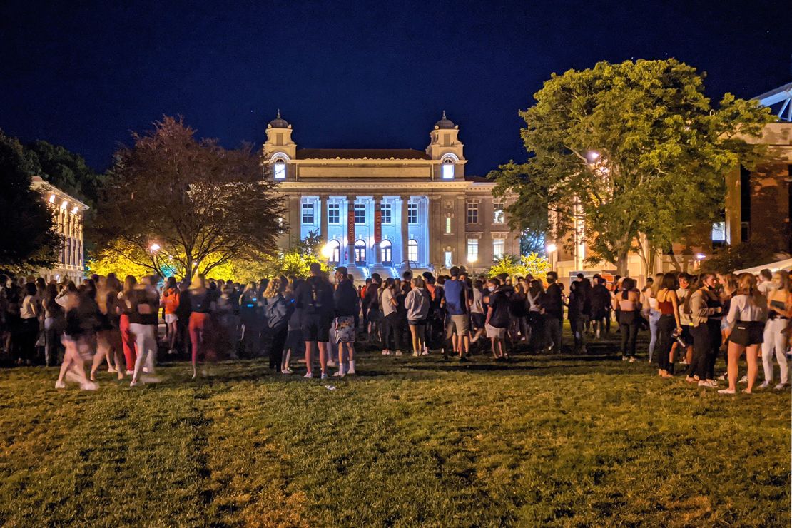 Syracuse University students gather Wednesday evening.
