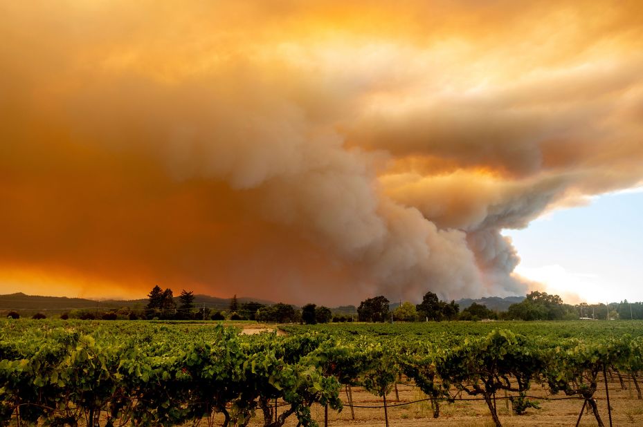 A smoke plume from the LNU Lightning Complex fires billows over Healdsburg, California, on August 20, 2020.