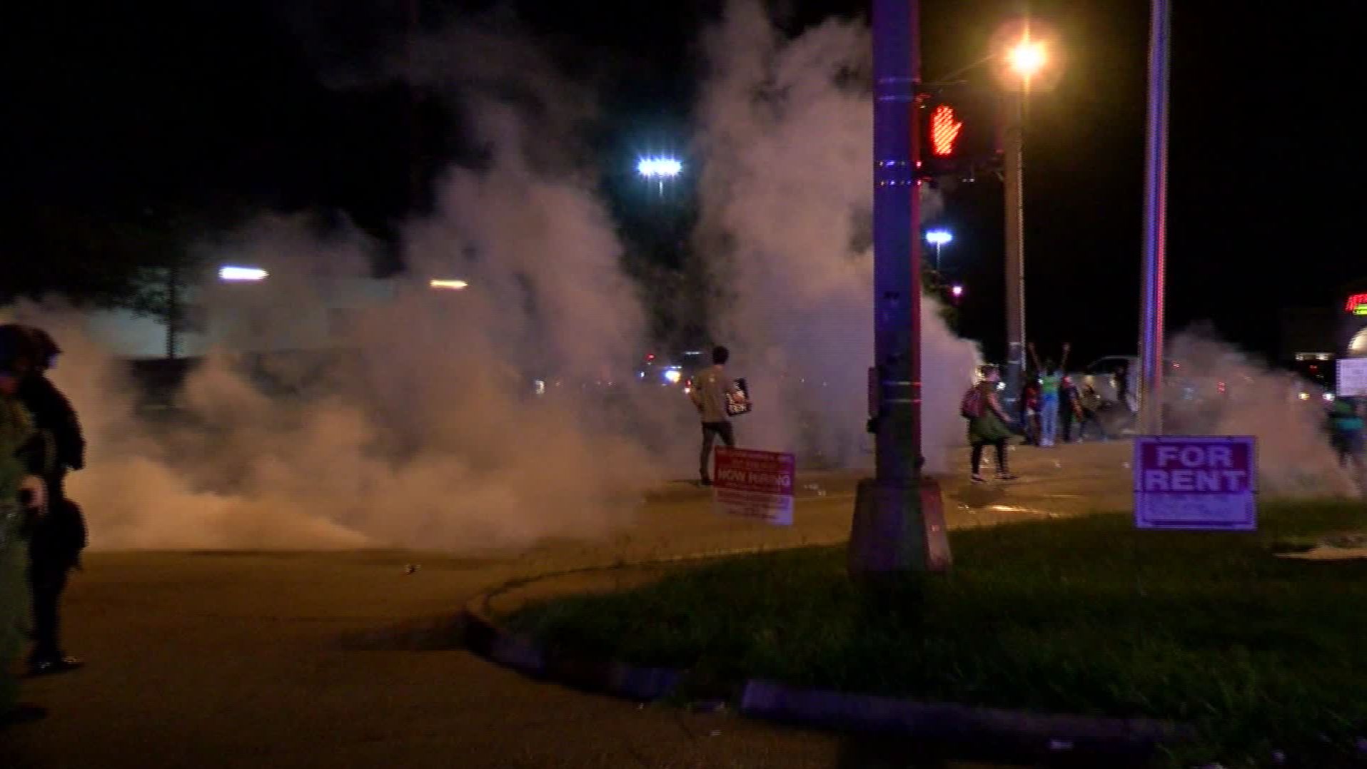 Police in riot gear released flares and smoke canisters into a crowd of protesters on August 22, 2020, CNN affiliate KATC reported.