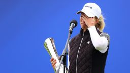 TROON, SCOTLAND - AUGUST 23: Sophia Popov of Germany holds the trophy as she gives a speech following victory in the final round during Day Four of the 2020 AIG Women's Open at Royal Troon on August 23, 2020 in Troon, Scotland. (Photo by Richard Heathcote/R&A/R&A via Getty Images)
