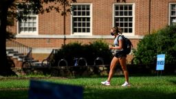 CHAPEL HILL, NC - AUGUST 18: A student walks through the campus of the University of North Carolina at Chapel Hill on August 18, 2020 in Chapel Hill, North Carolina. The school halted in-person classes and reverted back to online courses after a rise in the number of COVID-19 cases over the past week. (Photo by Melissa Sue Gerrits/Getty Images)