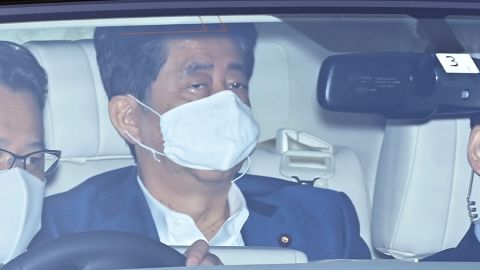 Japan's Prime Minister Shinzo Abe wearing a face mask arrives at Keio University Hospital for a clinical examination in Tokyo on Monday.