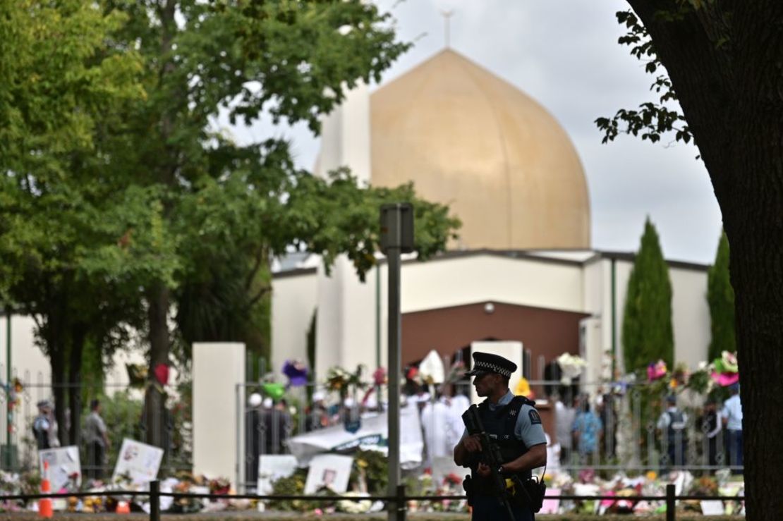 A policeman patrols as delegates and religious leaders wait to enter Al Noor Mosque in Christchurch on March 23, 2019.
