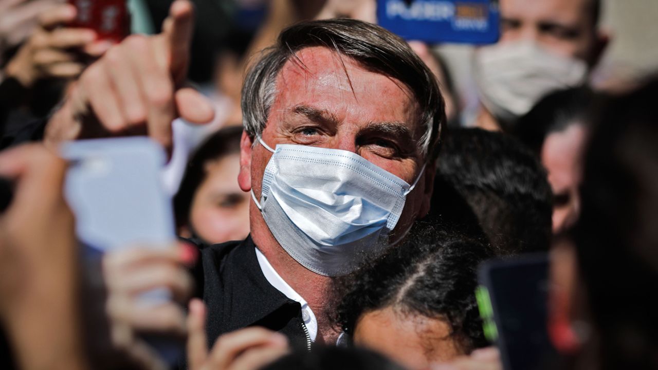 Brazilian President Jair Bolsonaro on Sunday threatened to punch a reporter in the mouth after being asked about his family's links to an alleged corruption scheme.