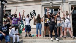 A small group of Black Lives Matter protesters held a rally on the steps of the Kenosha County courthouse Monday, Aug. 24, 2020, in Kenosha, Wis. where police shot a man Sunday evening.