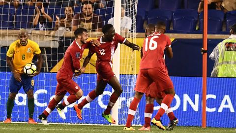 Alphonso Davies celebrates after scoring his first goal for Canada against French Guiana.