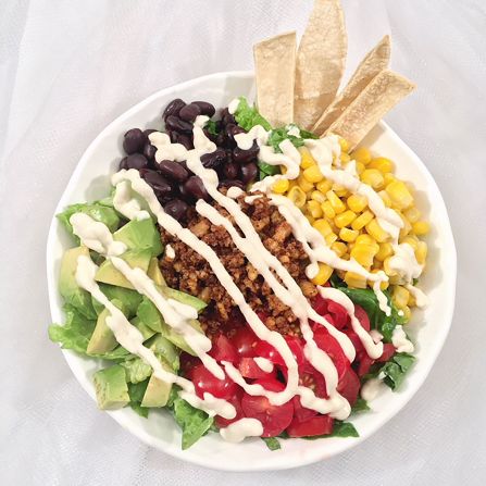 For a midday treat, this <a href="index.php?page=&url=http%3A%2F%2Fwww.lisadrayer.com%2Fwalnut-taco-salad%2F" target="_blank" target="_blank">walnut taco salad</a> with cashew-lime cream is a party of textures and flavors. 