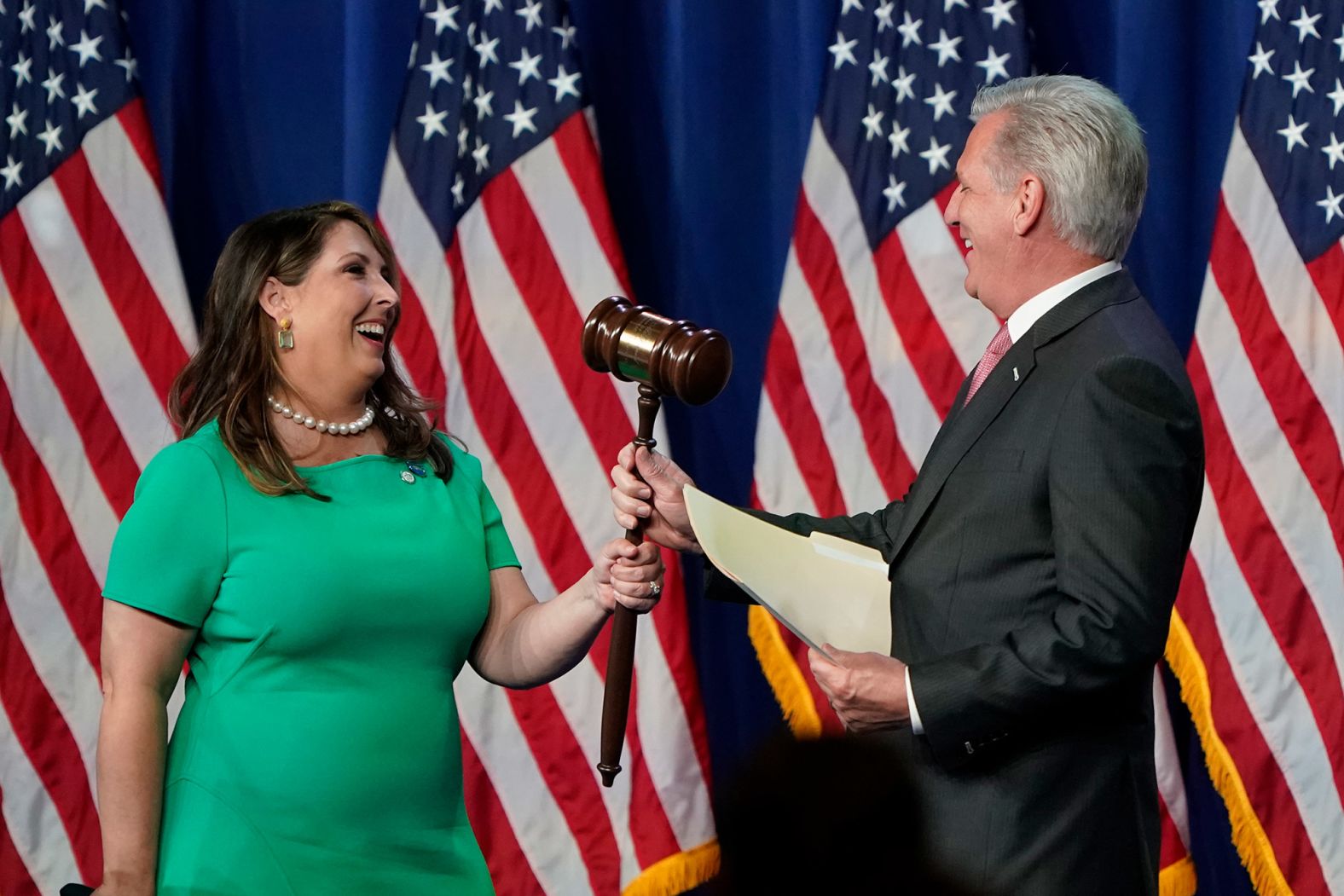 Ronna McDaniel, the chairwoman of the Republican National Committee, hands the gavel to House Minority Leader Kevin McCarthy before he spoke in Charlotte on Monday.