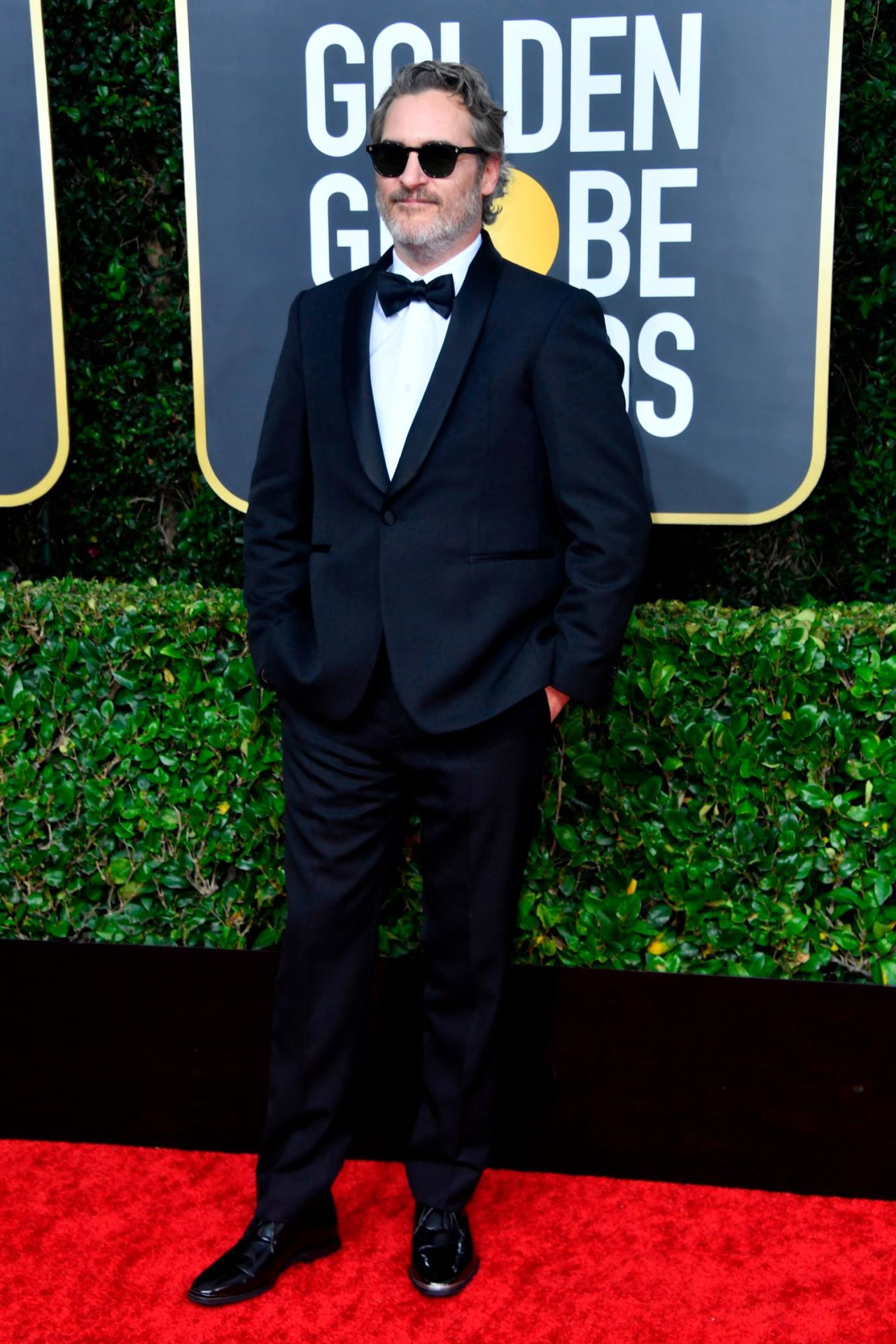 Joaquin Phoenix wore the same Stella McCartney tuxedo to successive awards ceremonies. 