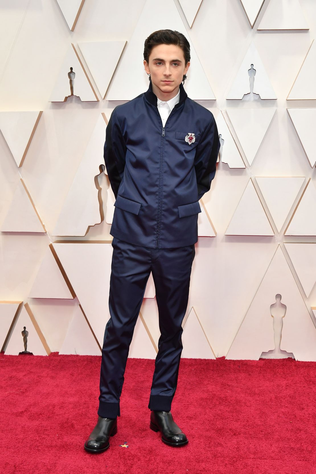 Timothée Chalamet's Prada outfit at the 2020 Oscars was made using yarn made from regenerated nylon, created from materials such as ocean plastics, fishing nets and textile fiber waste. A vintage Cartier brooch finished the look.