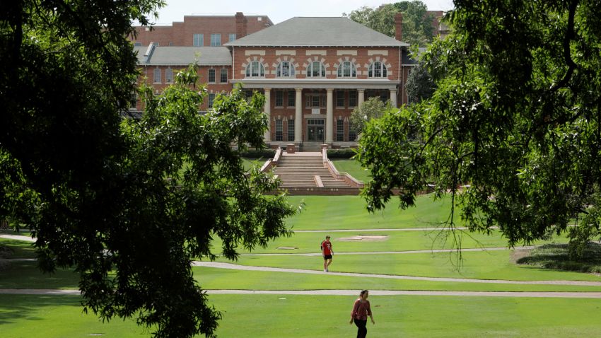 Students walk at the campus of North Carolina State University in Raleigh, North Carolina, U.S. August 7, 2020. Picture taken August 7, 2020. REUTERS/Jonathan Drake