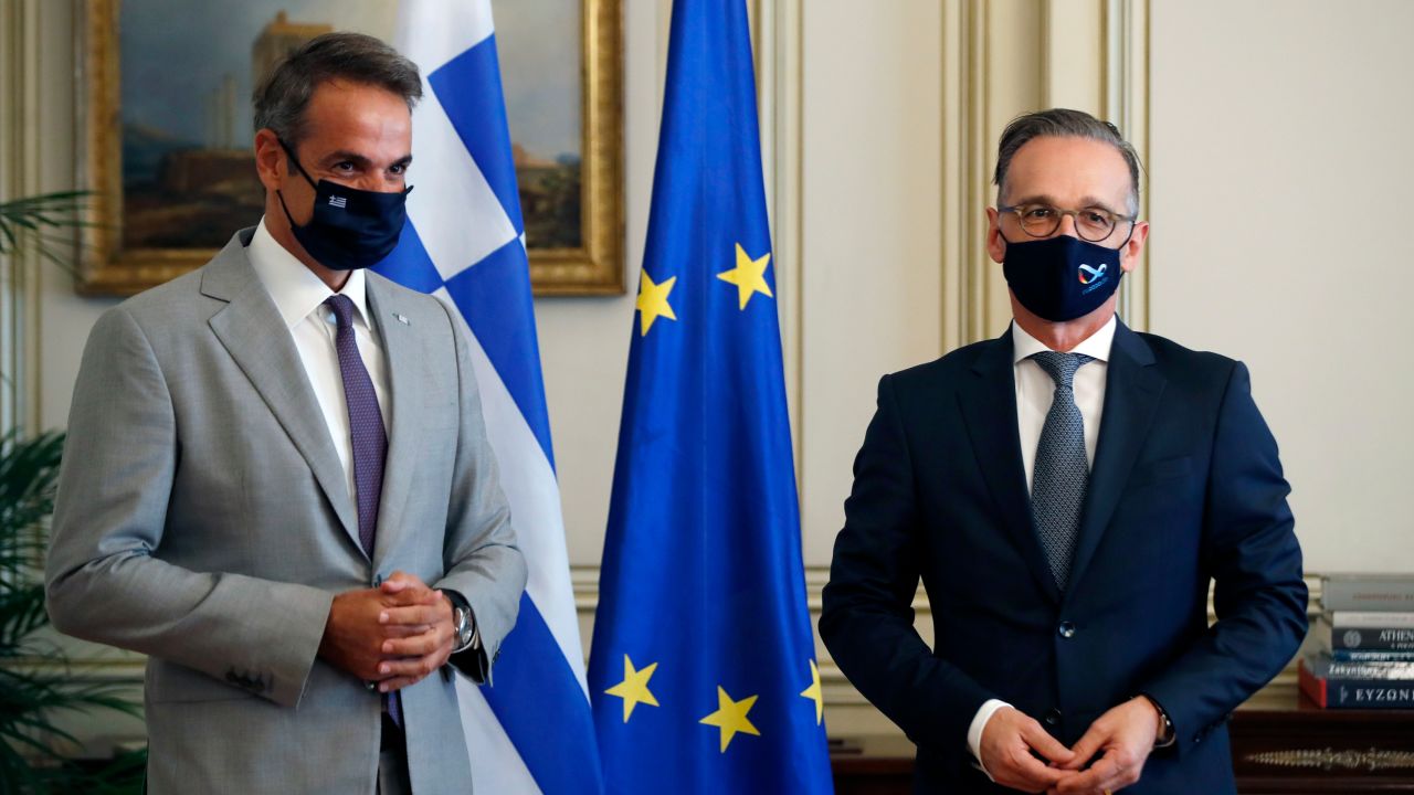 Greece's Prime Minister Kyriakos Mitsotakis, left, and Germany's Foreign Minister Heiko Maas met in Athens on Aug. 25, 2020.