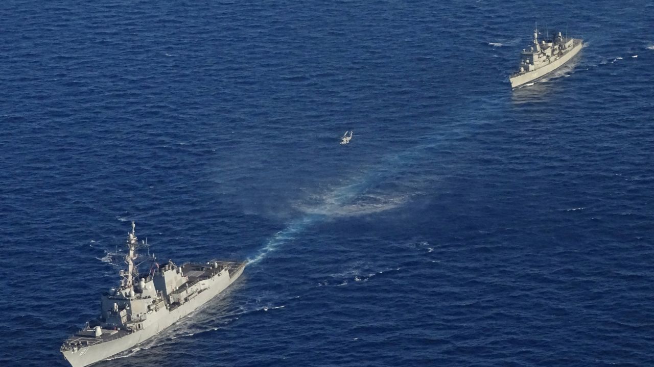 In this photo provided by the Greek National Defense Ministry, warships take part in a Greek-US military exercise south of the island of Crete, on Aug. 24, 2020.