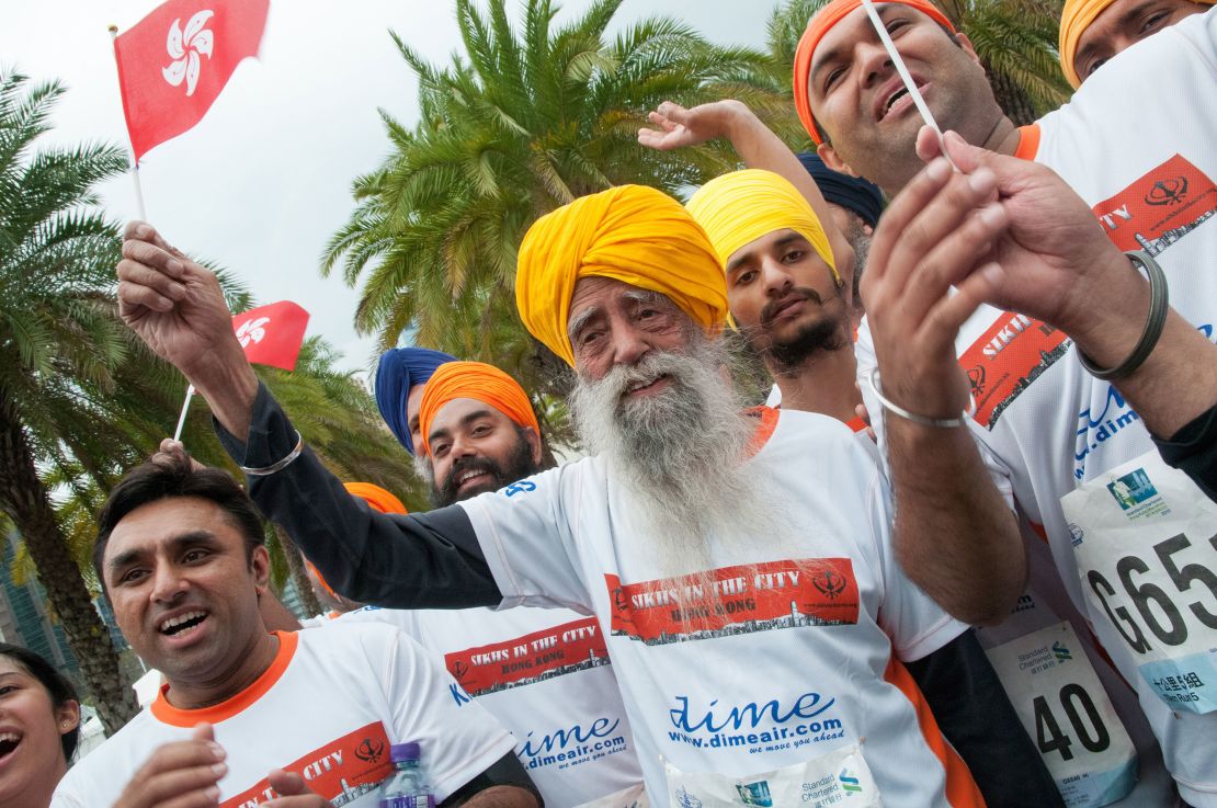 Fauja Singh, at 101 years old, participates in the 10K run during the 2013 Hong Kong Marathon.