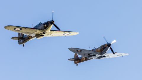 A Hawker Hurricane, left, and  Spitfire, right, are seen over England in April 2020.