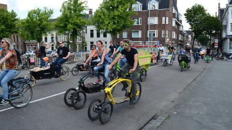 Cyclists ride cargo bikes at a parade during the International Cargo Bike Festival in Groningen, Netherlands in June 2019.