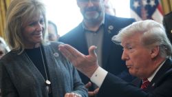 WASHINGTON, DC - MARCH 15: U.S. President Donald Trump (R) greets Angel Mom Mary Ann Mendoza (L) of Mesa Arizona, during an event on border security in the Oval Office of the White House March 15, 2019 in Washington, DC. President Trump has vetoed the congressional resolution that blocks his national emergency declaration on the southern border.  (Photo by Alex Wong/Getty Images)