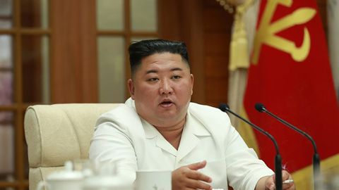 Images released by North Korean state media Wednesday show Kim Jong Un holding a politburo meeting.