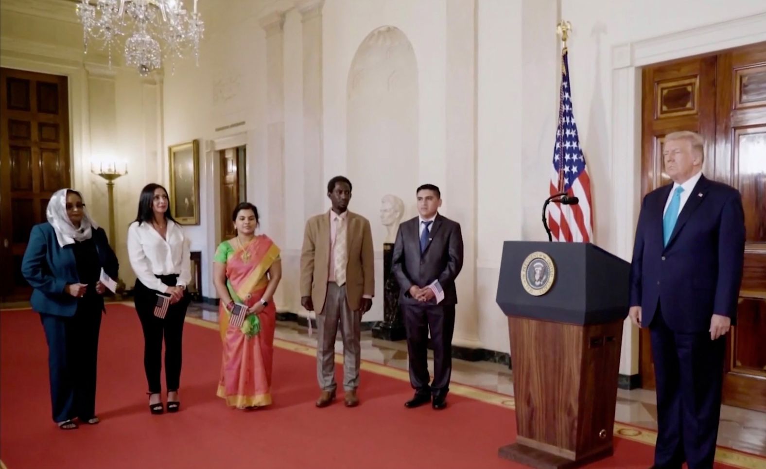 Trump oversees a naturalization ceremony for five new US citizens at the White House. "You followed the rules, you obeyed the laws, you learned your history, embraced our values and proved yourselves to be men and women of the highest integrity," the President said at <a href="https://www.cnn.com/politics/live-news/rnc-2020-day-2/h_0246810184cdb78a886aa2635099d041" target="_blank">the ceremony,</a> which occurred earlier in the day on Tuesday. "It's not so easy. You went through a lot, and we appreciate you being here with us today."