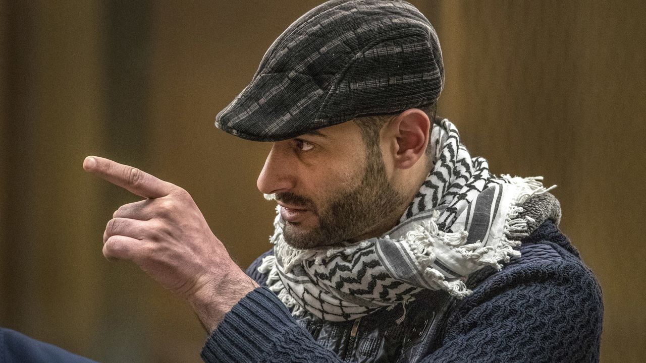 Mosque shooting survivor Khaled Alnobani points at the gunman, 29-year-old Australian Brenton Harrison Tarrant, on August 24, 2020.