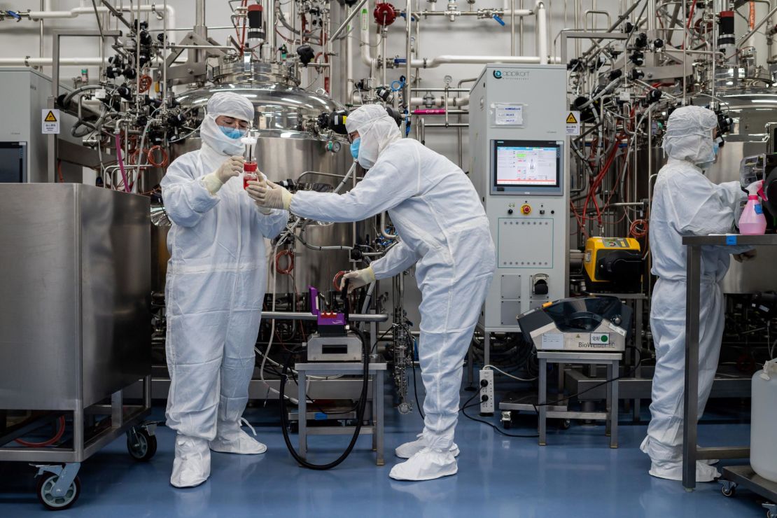 Engineers work on monkey kidney cells for an experimental Covid-19 vaccine at the Sinovac Biotech facilities in Beijing on April 29.