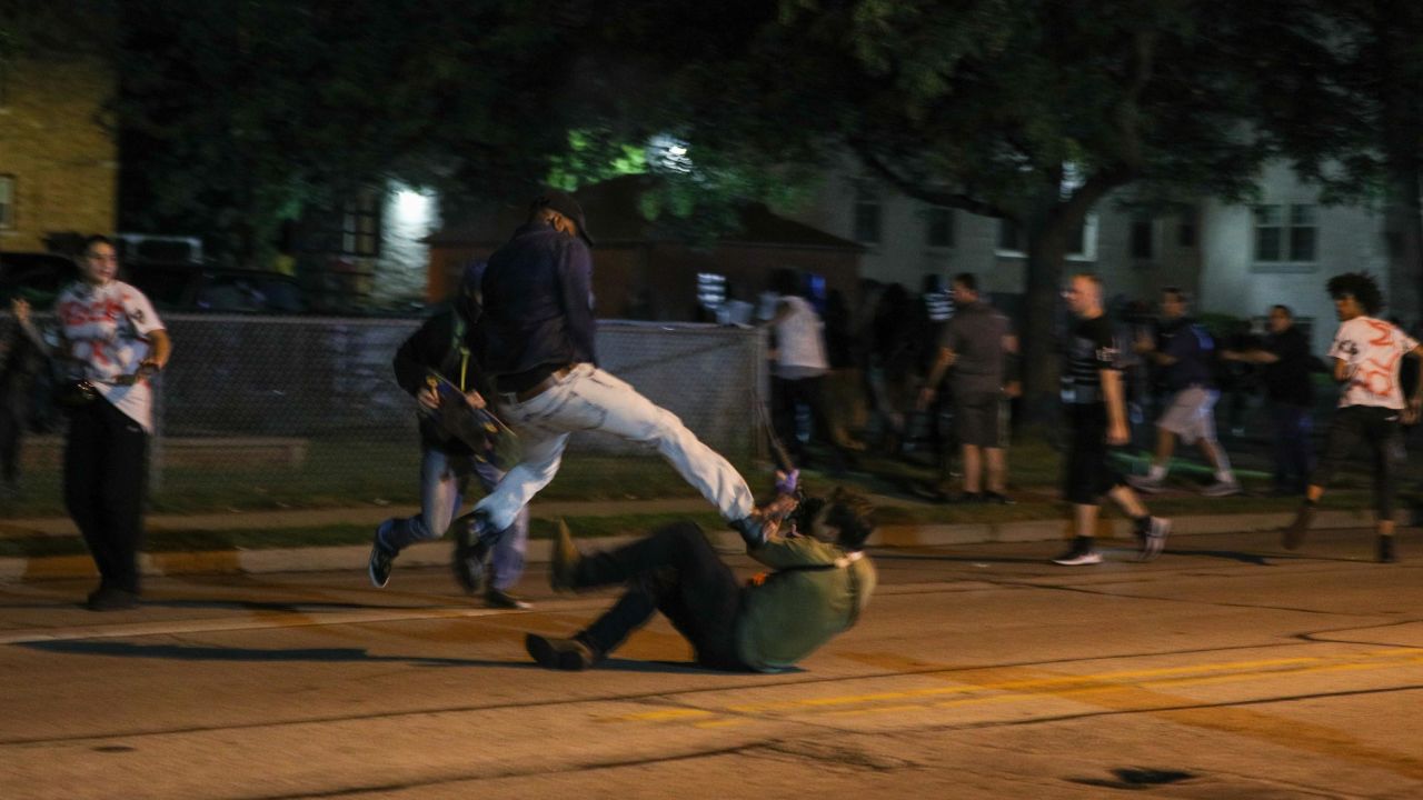 Clashes between protesters and at least one armed civilian break out during the third day of protests over the shooting of Jacob Blake by a police officer in Wisconsin.