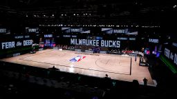 LAKE BUENA VISTA, FLORIDA - AUGUST 26: An empty court and bench is shown before the start of a scheduled game between the Milwaukee Bucks and the Orlando Magic for Game Five of the Eastern Conference First Round during the 2020 NBA Playoffs at AdventHealth Arena at ESPN Wide World Of Sports Complex on August 26, 2020 in Lake Buena Vista, Florida. NOTE TO USER: User expressly acknowledges and agrees that, by downloading and or using this photograph, User is consenting to the terms and conditions of the Getty Images License Agreement. (Photo by Kevin C. Cox/Getty Images)