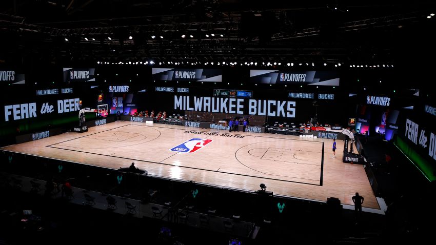 LAKE BUENA VISTA, FLORIDA - AUGUST 26: An empty court and bench is shown before the start of a scheduled game between the Milwaukee Bucks and the Orlando Magic for Game Five of the Eastern Conference First Round during the 2020 NBA Playoffs at AdventHealth Arena at ESPN Wide World Of Sports Complex on August 26, 2020 in Lake Buena Vista, Florida. NOTE TO USER: User expressly acknowledges and agrees that, by downloading and or using this photograph, User is consenting to the terms and conditions of the Getty Images License Agreement. (Photo by Kevin C. Cox/Getty Images)