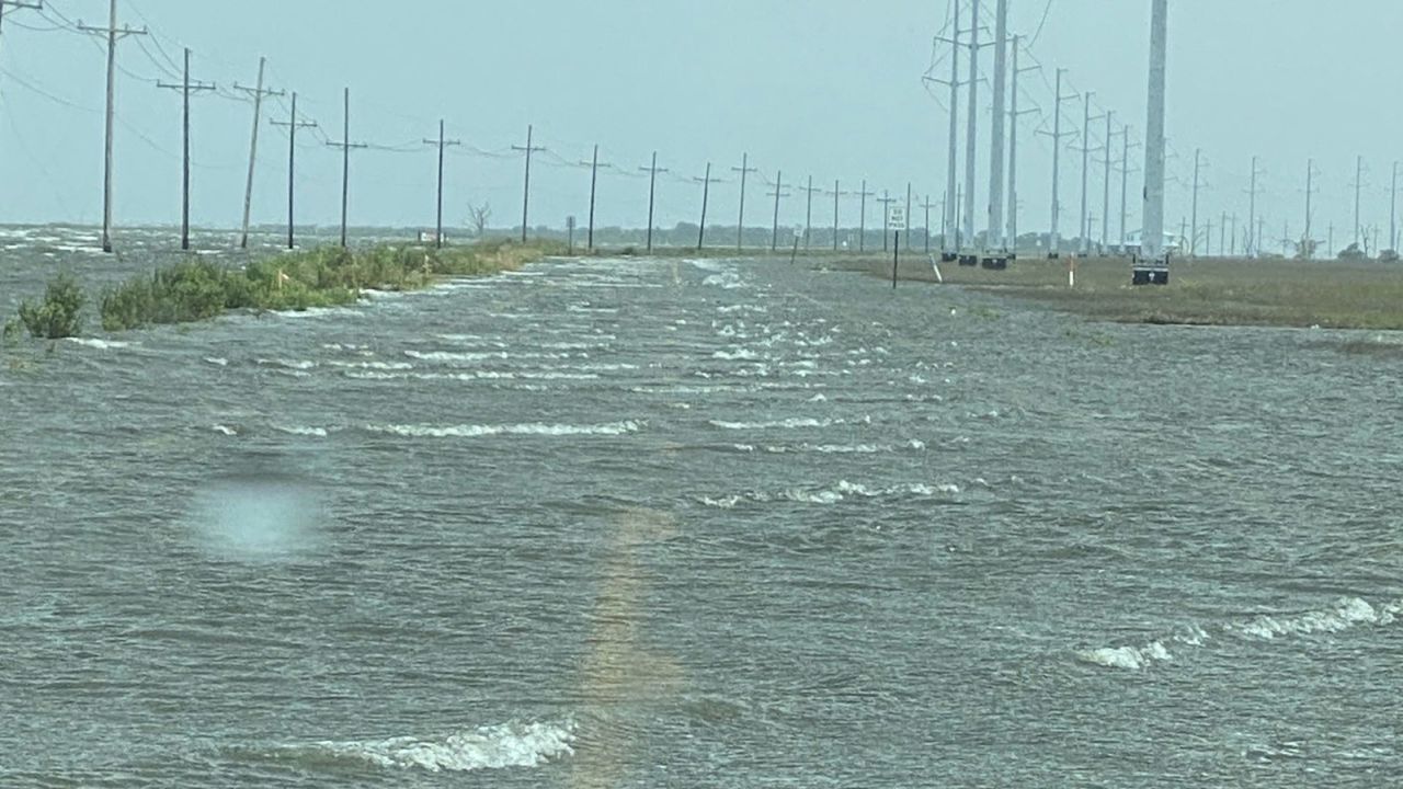 Storm surge flooded state highway 1 in Golden Meadow, Louisiana, Wednesday.