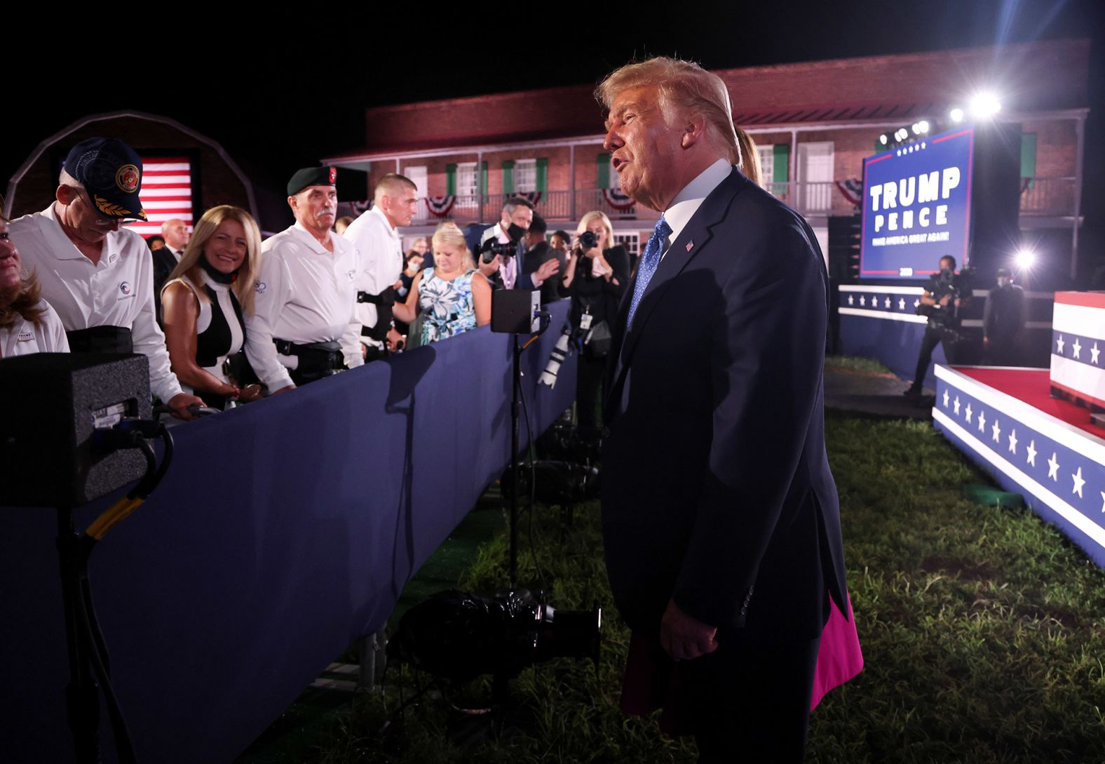 The President greets the crowd after Pence's speech Wednesday.