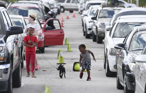 Children play at the Circuit of the Americas racetrack, where some evacuees were settling in Austin, Texas, on August 26.