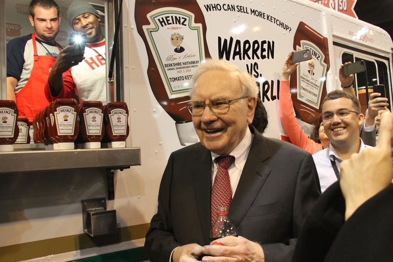 Buffett introduces products to shareholders before their annual meeting in 2014.