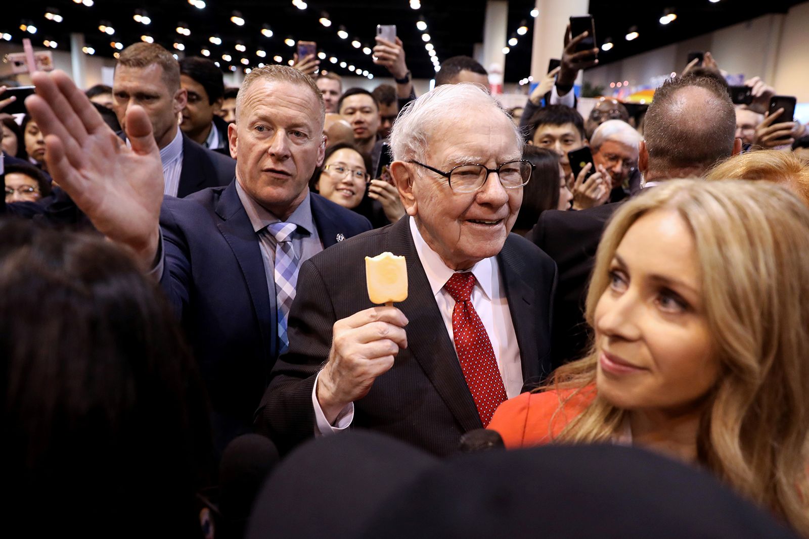 Buffett walks through the exhibit hall during Berkshire Hathaway's shareholders meeting in 2019.