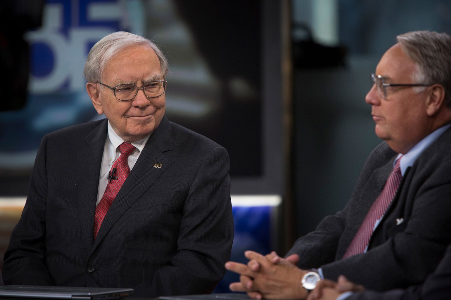 Buffett listens as his son Howard speaks during an interview in New York in 2013. Buffett and his late first wife, Susan, gave and pledged billions to each of their three children to fund charitable foundations. Howard, an Illinois farmer, picked global hunger as his target.