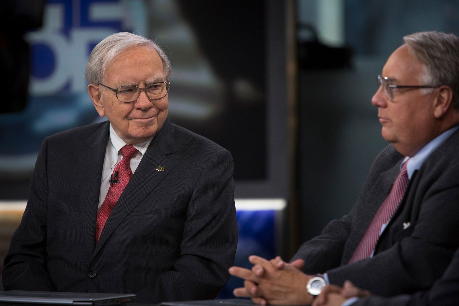 Buffett listens as his son Howard speaks during an interview in New York in 2013. Buffett and his late first wife, Susan, gave and pledged billions to each of their three children to fund charitable foundations. Howard, an Illinois farmer, picked global hunger as his target.