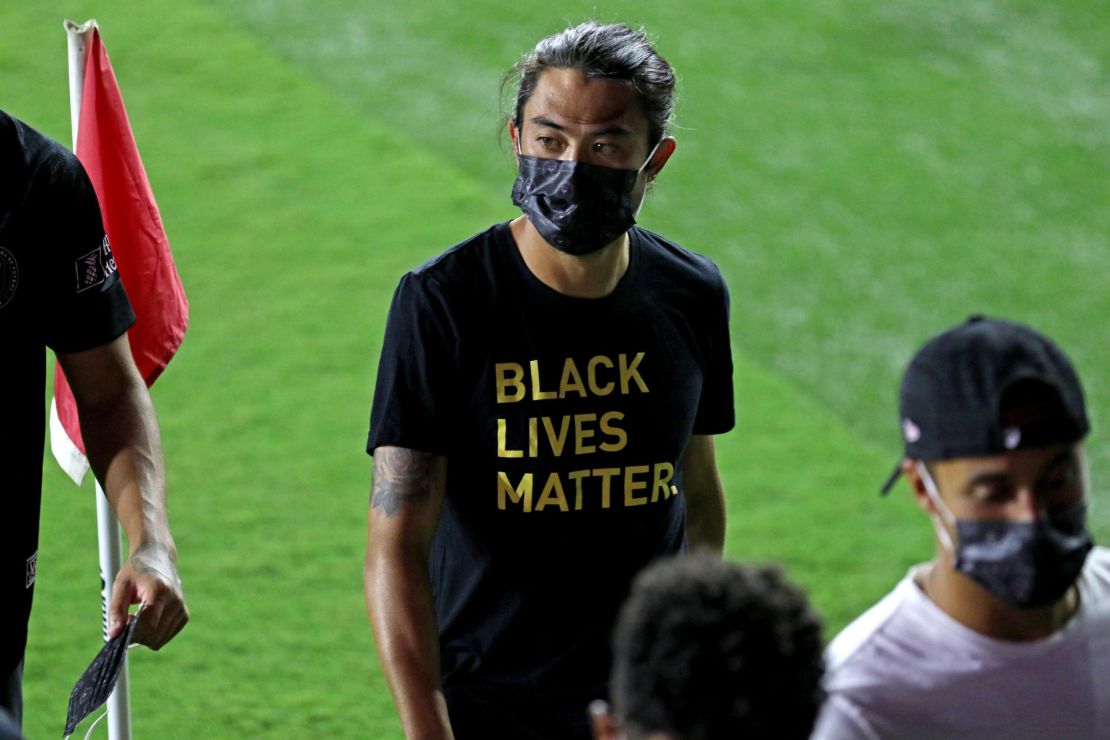 Inter Miami midfielder Lee Nguyen exits the field after Inter Miami and Atlanta United players decided not to play.
