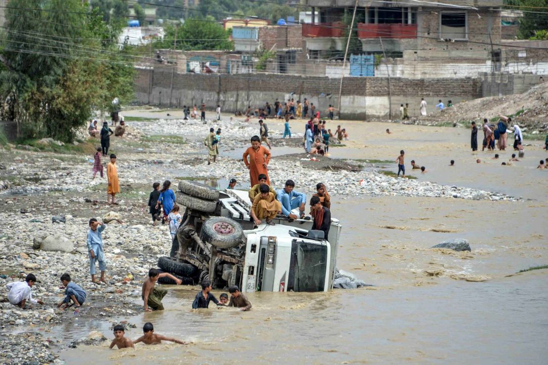 Dozens of houses and vehicles have been destroyed in the floods, and the number of casulties could be higher, officials warn.