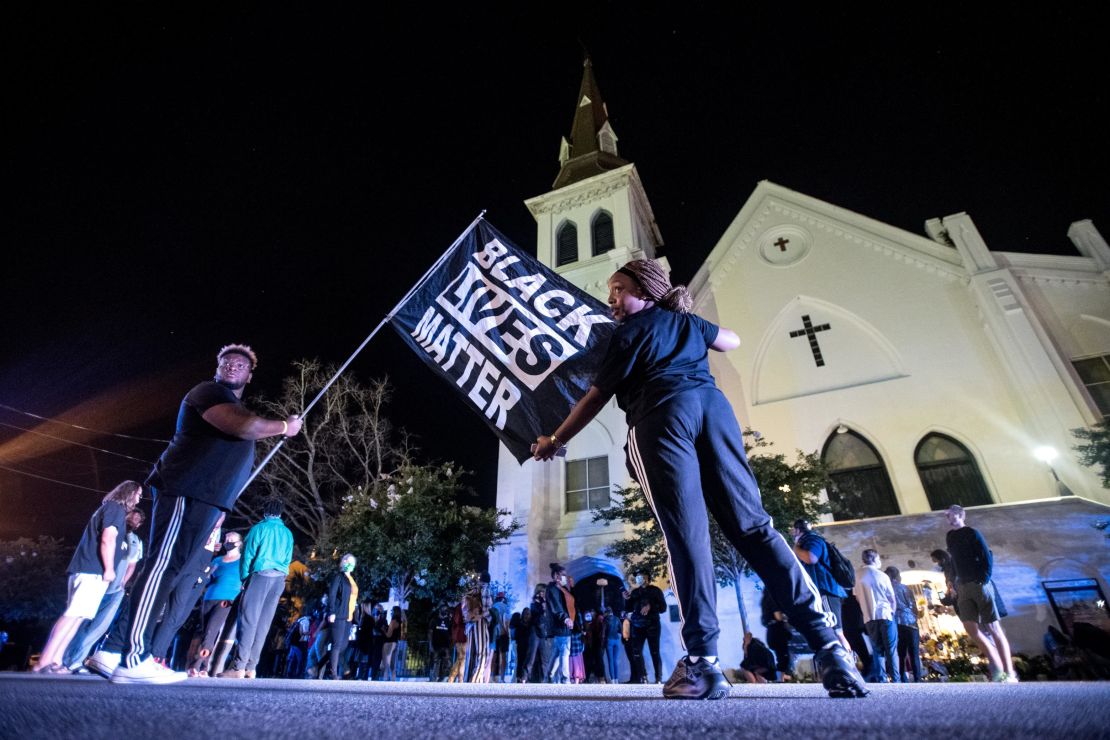 Demonstrators gather outside of Emanuel AME Church on the fifth anniversary of the Charleston Massacre on June 17, 2020.