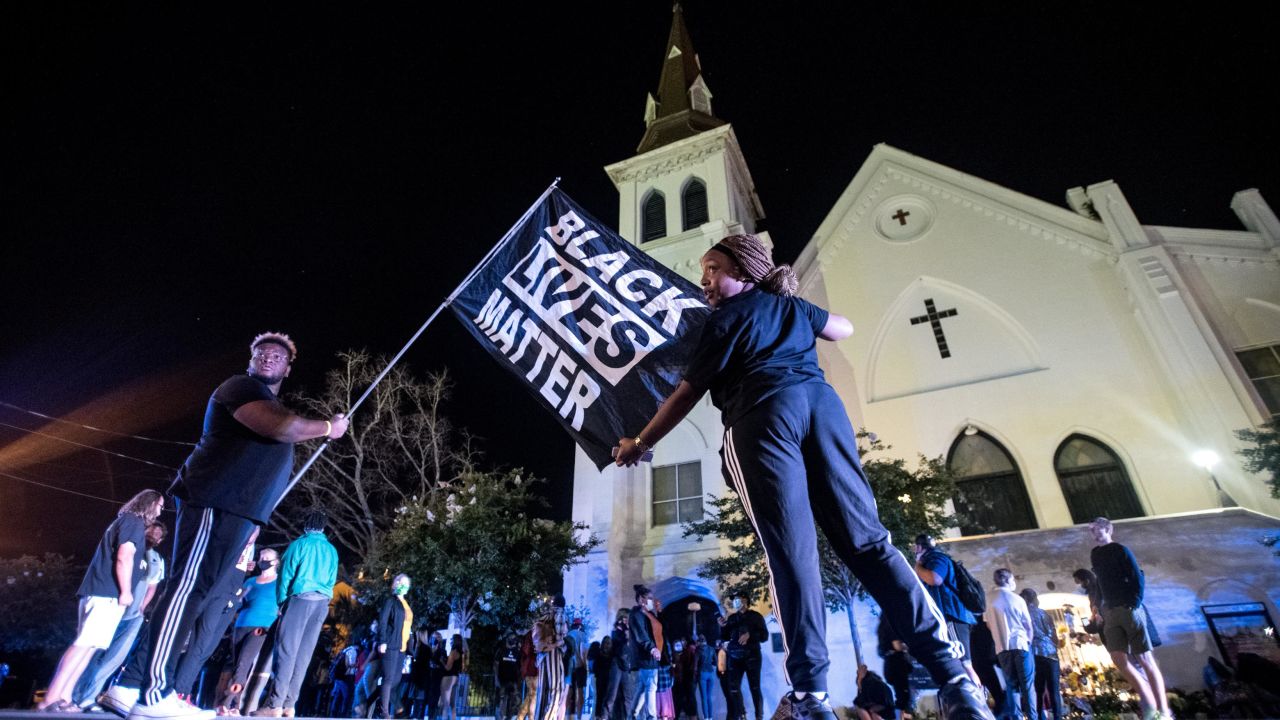 Demonstrators gather outside of Emanuel AME Church on the fifth anniversary of the Charleston Massacre on June 17, 2020.