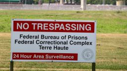 A No Trespassing sign stands in front of the federal prison complex in Terre Haute, Ind. Friday, July 17, 2020. A judge in Washington is halting for now the government's planned Friday execution at the federal prison in Terre Haute, Indiana of Keith Dwayne Nelson who was convicted of kidnapping, raping and murdering at 10-year-old Kansas girl. 