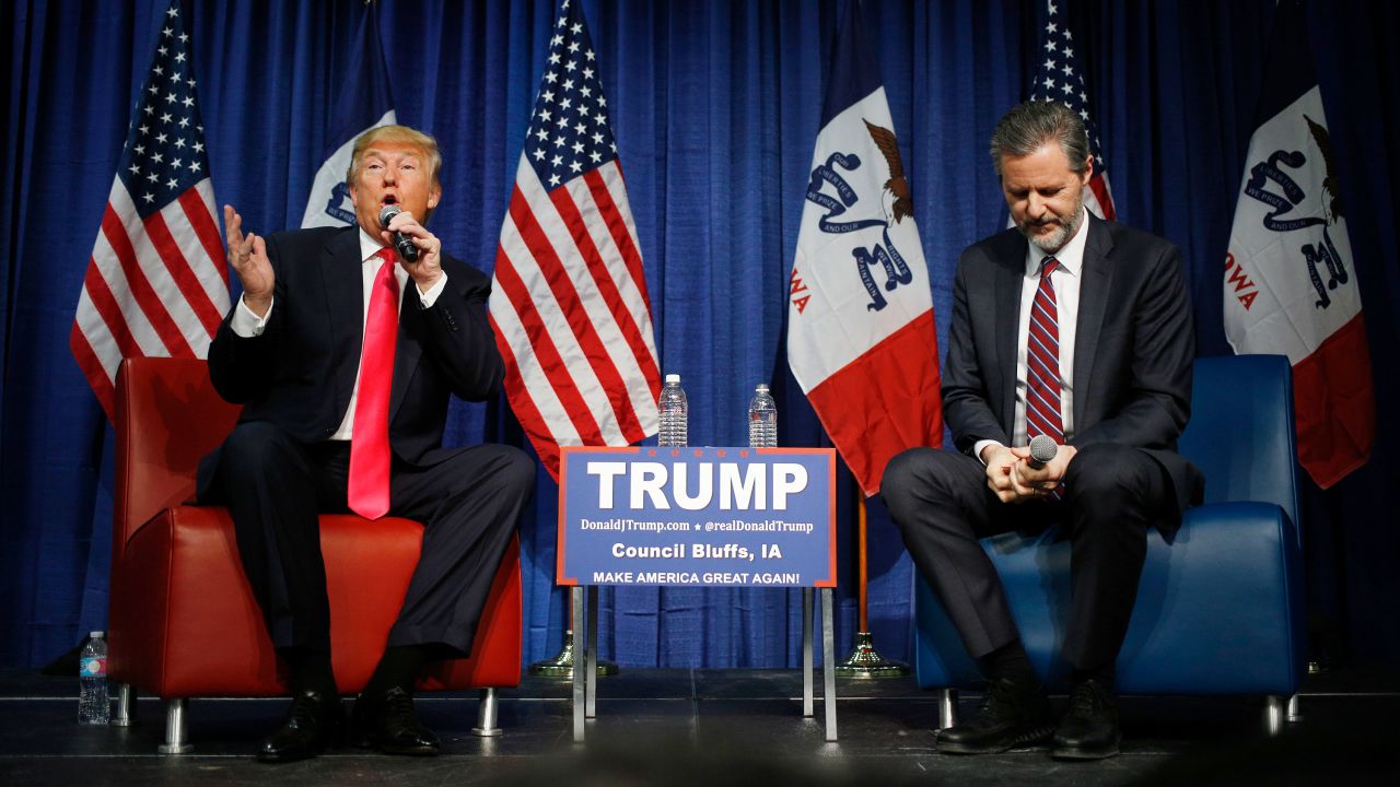 Then-candidate Donald Trump speaks on stage with Jerry Falwell Jr. during a campaign rally in Council Bluffs, Iowa, in January 2016. 