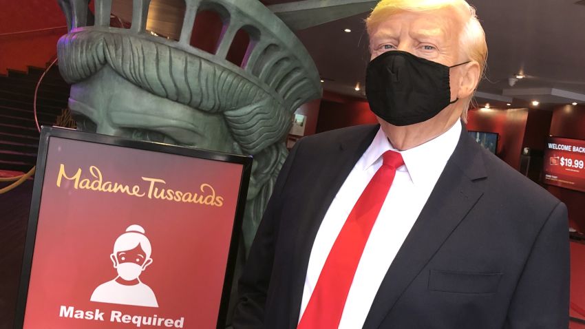 A statue of President Donald Trump at Madame Tussauds Museum in New York now wears a mask.